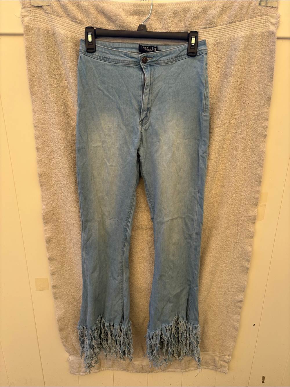 Blue shredded bell bottoms/flare legs